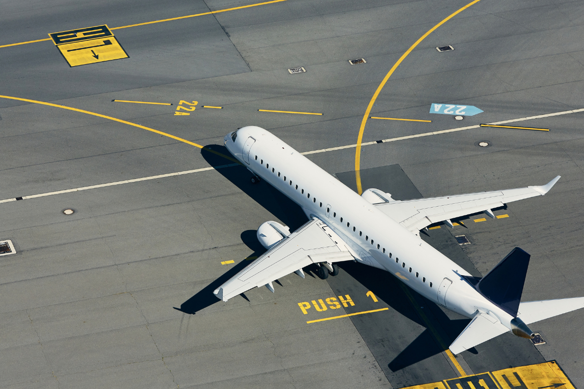Aircraft parked on the tarmac ready for cargo transfer.