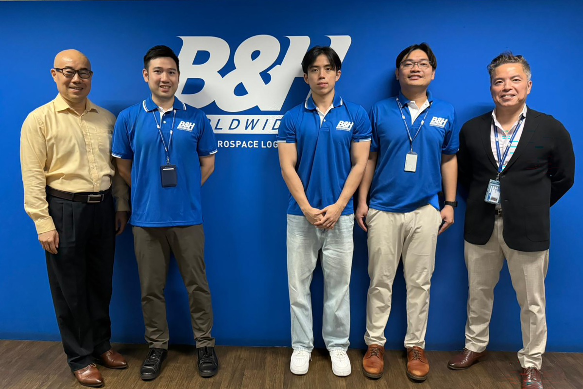 B&H Worldwide team with new marketing intern at Singapore office.