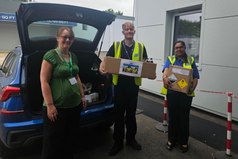 Team members delivering food donations for Yiewsley & West Drayton Food Bank.